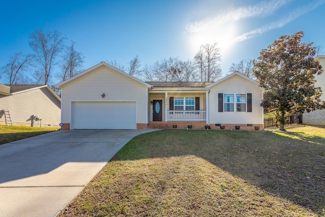 ranch-style house with a garage, a front yard, and covered porch