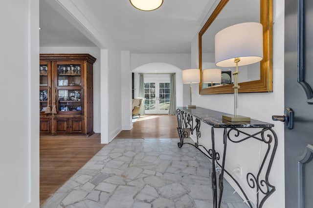 hallway featuring hardwood / wood-style floors