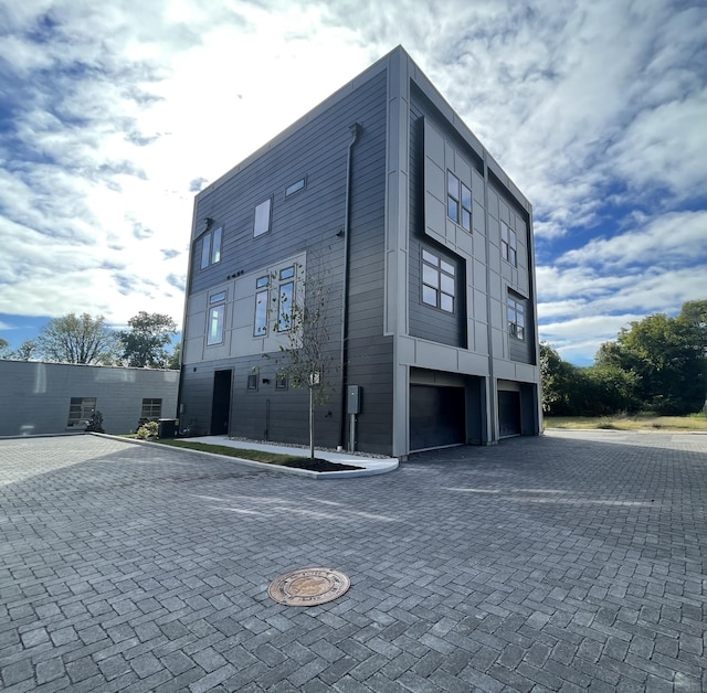 view of building exterior with a garage