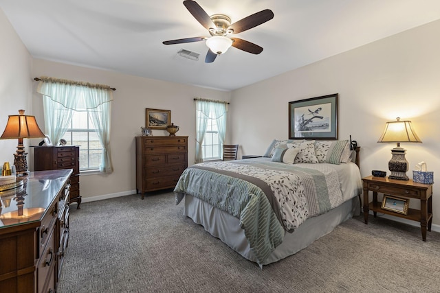 carpeted bedroom featuring ceiling fan