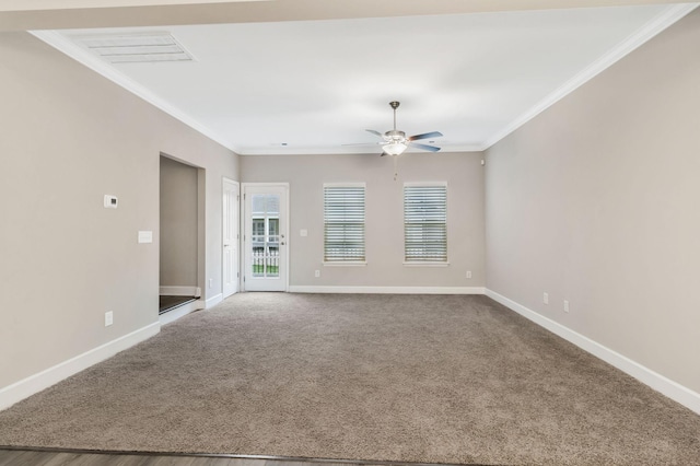 empty room with ornamental molding and ceiling fan