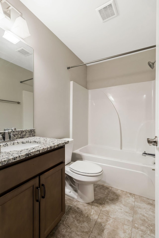 full bathroom featuring vanity, shower / bathing tub combination, and toilet