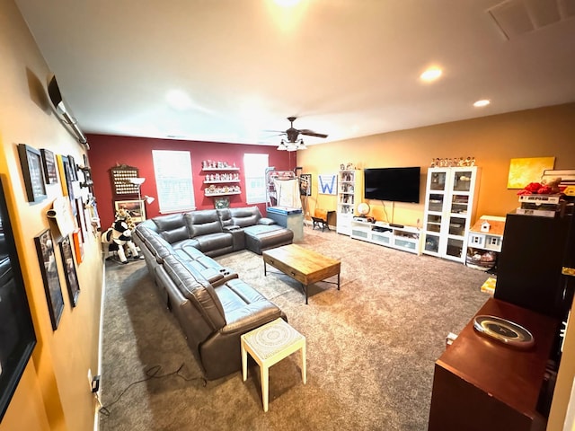 living room featuring ceiling fan and carpet flooring