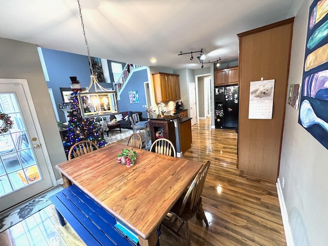 dining room featuring dark hardwood / wood-style flooring