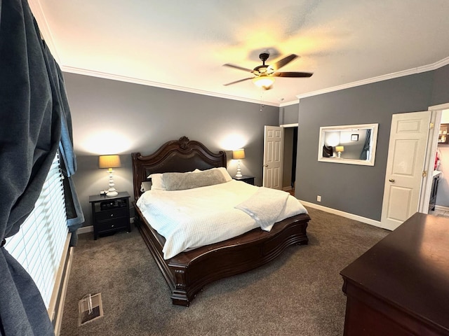 bedroom featuring ornamental molding, dark carpet, and ceiling fan