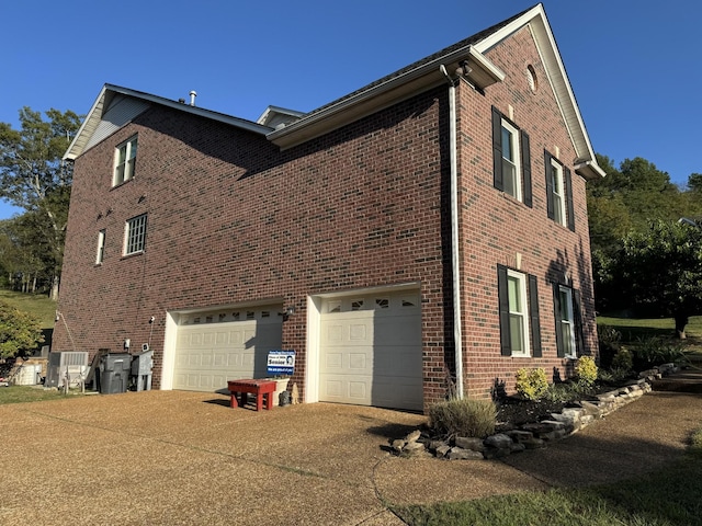 view of home's exterior with a garage