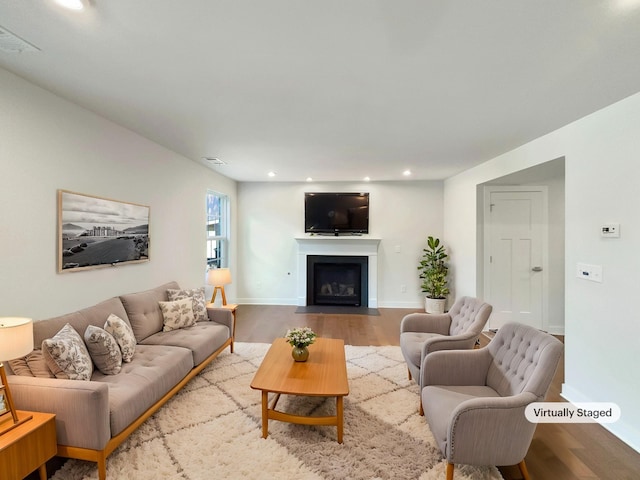 living room with light hardwood / wood-style floors