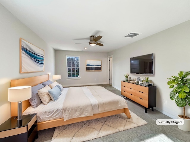 carpeted bedroom featuring ceiling fan