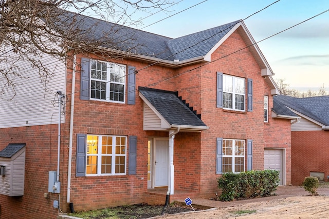 view of front of home featuring a garage