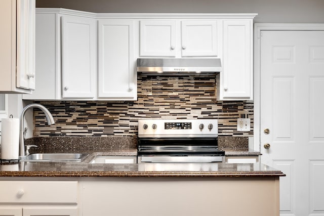 kitchen with white cabinetry, sink, tasteful backsplash, and stainless steel electric range oven