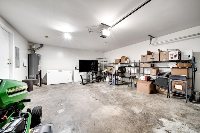 garage featuring a garage door opener, gas water heater, electric panel, and refrigerator