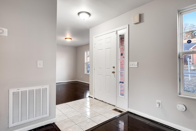 view of tiled foyer entrance