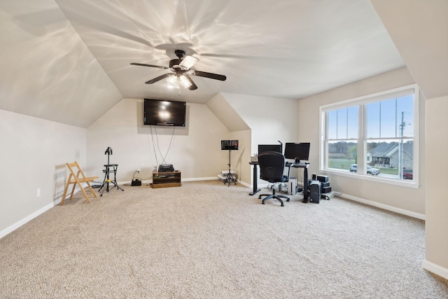 office space featuring ceiling fan, carpet flooring, and vaulted ceiling