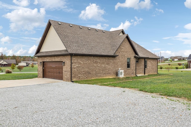 view of side of property featuring a yard