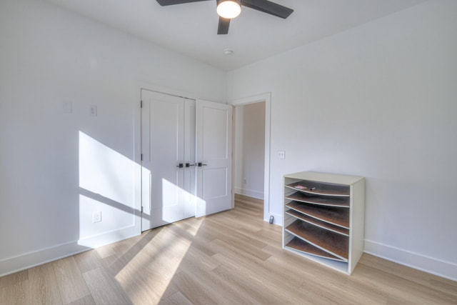 unfurnished bedroom featuring light hardwood / wood-style floors and ceiling fan