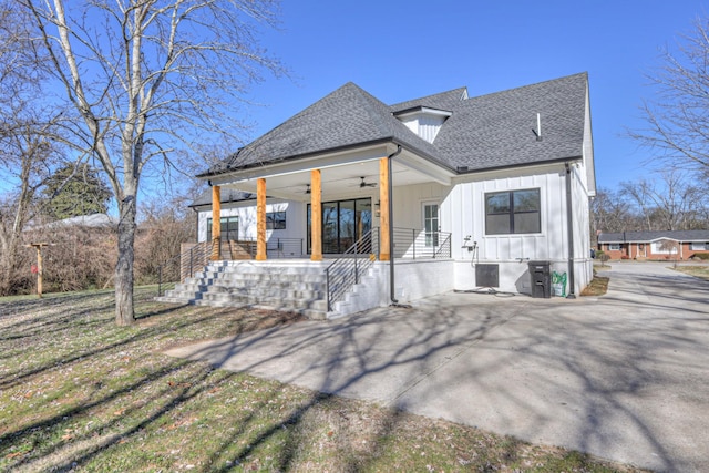 back of property featuring a porch and ceiling fan