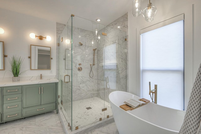 bathroom with vanity, plus walk in shower, and a wealth of natural light