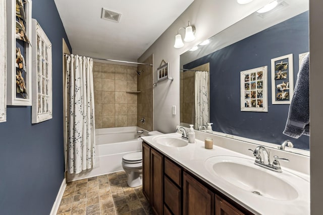 full bathroom with vanity, shower / bath combination with curtain, and toilet