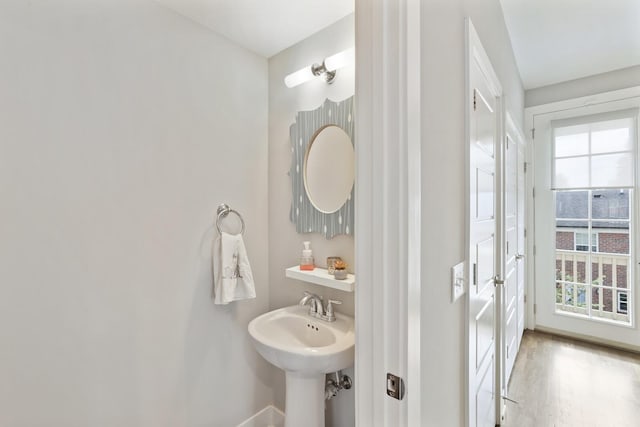 bathroom featuring hardwood / wood-style flooring