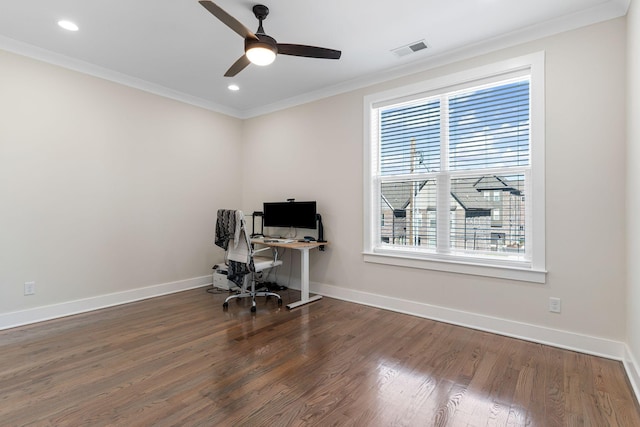 office featuring visible vents, crown molding, baseboards, and wood finished floors