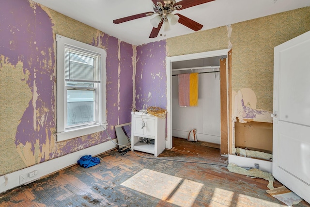 unfurnished bedroom with ceiling fan