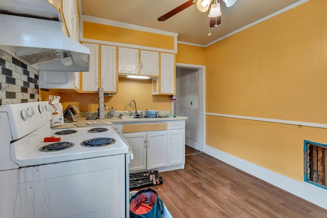 kitchen with extractor fan, white range with electric stovetop, wood-type flooring, white cabinets, and crown molding