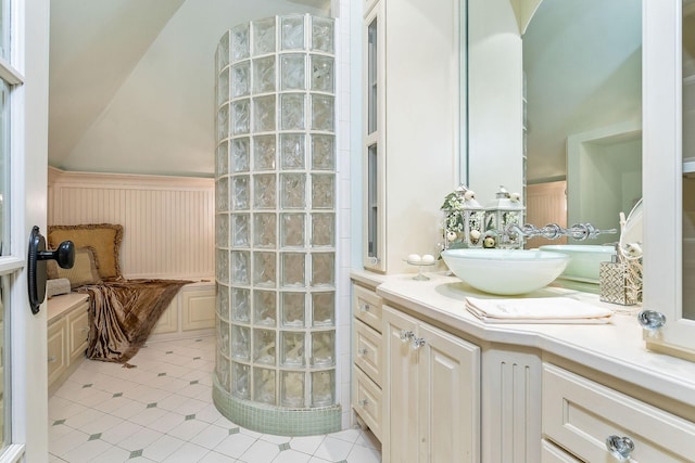 bathroom with tile patterned flooring and vanity