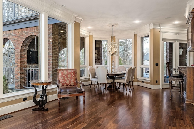 sunroom with a chandelier