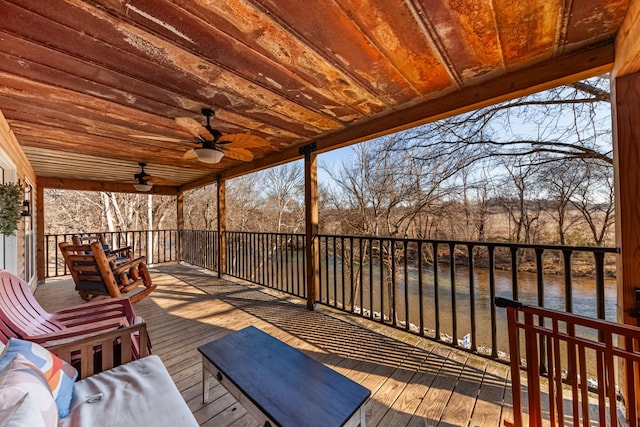 wooden deck with ceiling fan