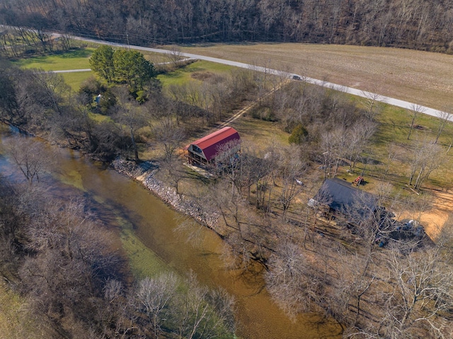 birds eye view of property with a rural view