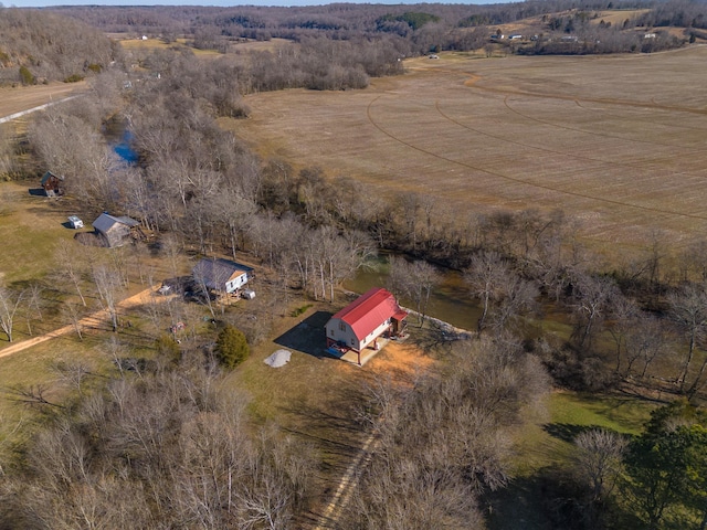 birds eye view of property with a rural view