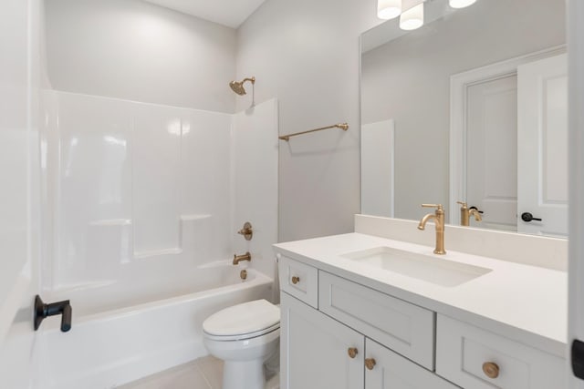 full bathroom with tile patterned flooring, shower / washtub combination, vanity, and toilet