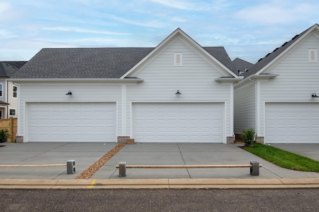 single story home featuring a garage