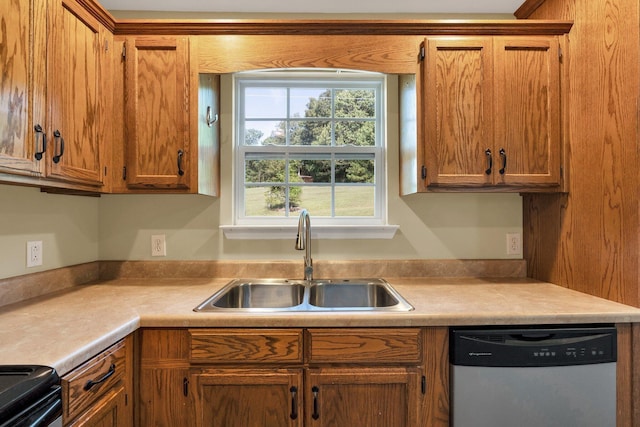 kitchen with electric range oven, a sink, light countertops, brown cabinets, and dishwasher