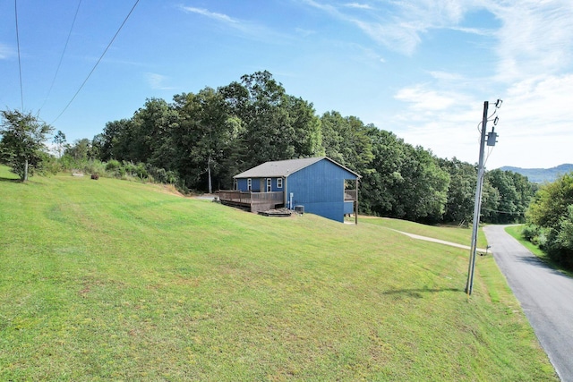 view of yard with a deck