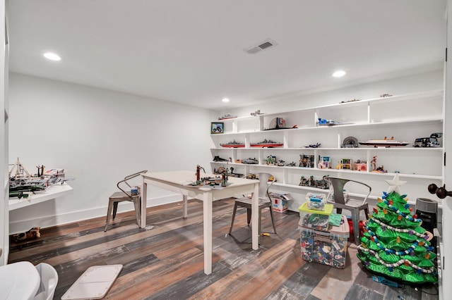 home office with dark wood-type flooring