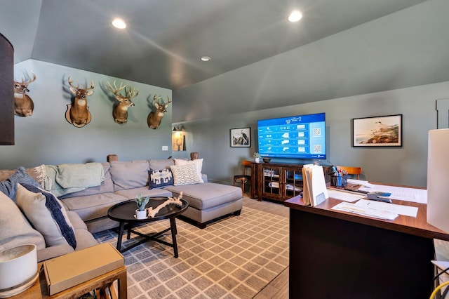 living room with vaulted ceiling