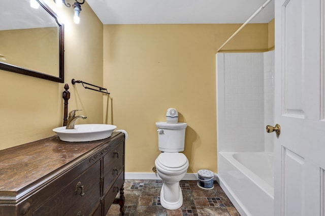 full bathroom with vanity, bathtub / shower combination, and toilet