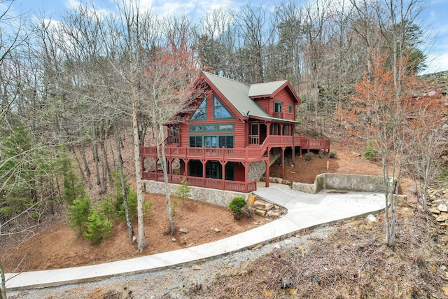 view of front of property with a wooden deck