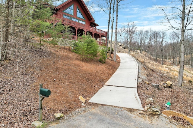 exterior space featuring a wooden deck