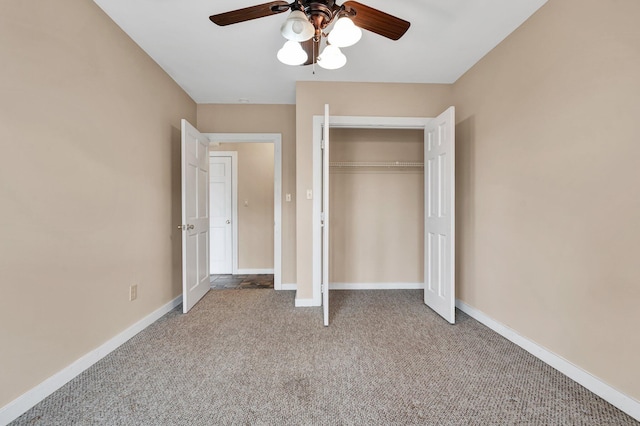 unfurnished bedroom with light colored carpet, a closet, and ceiling fan