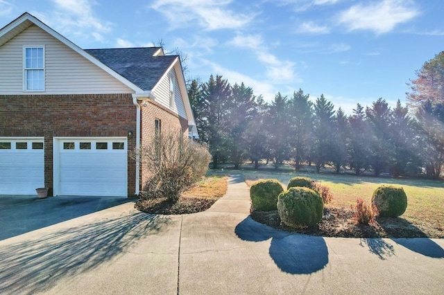 view of home's exterior featuring a garage