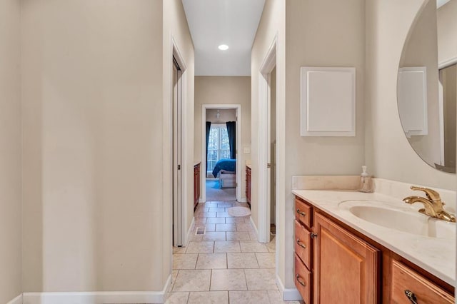 bathroom featuring vanity and tile patterned flooring