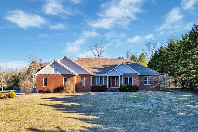 single story home with a front yard