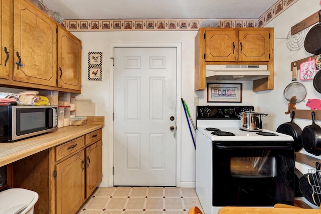 kitchen with range with electric cooktop and a textured ceiling