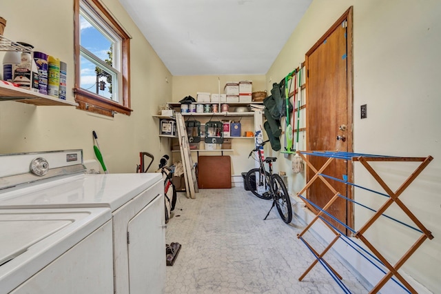 clothes washing area with independent washer and dryer