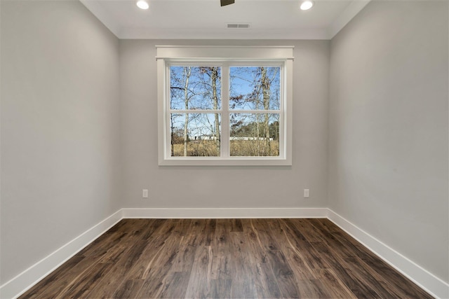 empty room featuring dark hardwood / wood-style floors