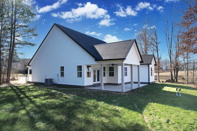 back of house with a lawn, cooling unit, ceiling fan, and a patio area