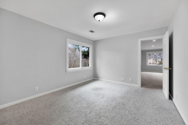 view of carpeted spare room