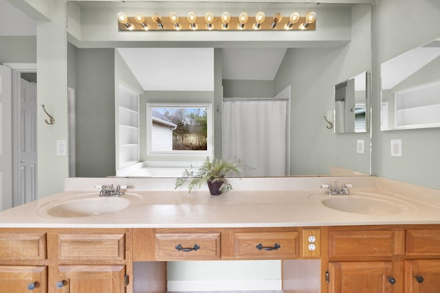 bathroom featuring vanity, lofted ceiling, and a shower with shower curtain